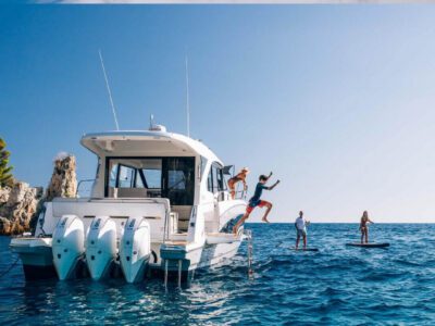 Antares 12 Coupe people jumping off the boat
