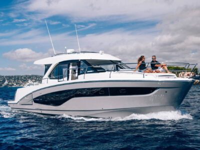 Antares 12 Coupe with a couple on deck