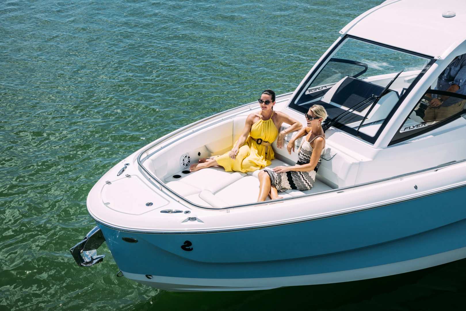 Flyer 30 with sunbathers at bow