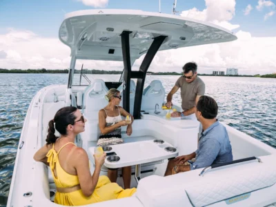 Flyer 30 with 2 couples having drinks at the table with wet bar