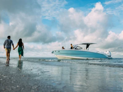Flyer 30 hovering coast line with couple walking on the beach